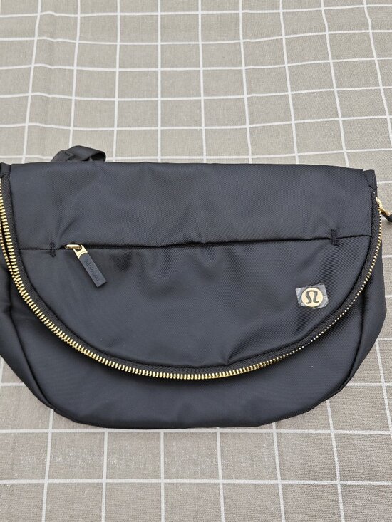 lululemon athletica Handbags - Lululemon gold All Night Festival Bag 5L